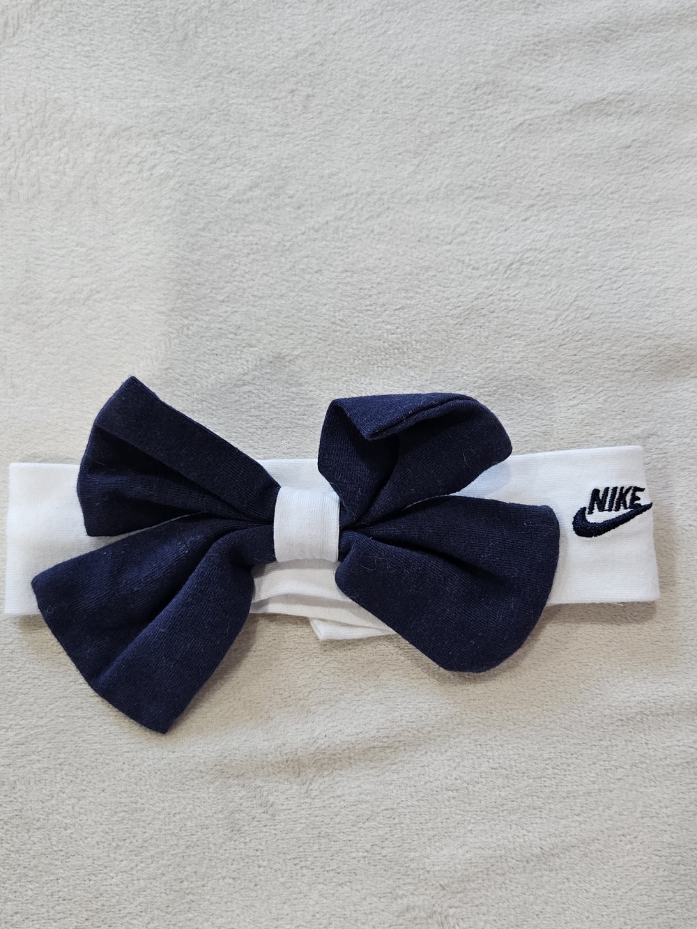 Nike Kids White Headband with Navy Bow